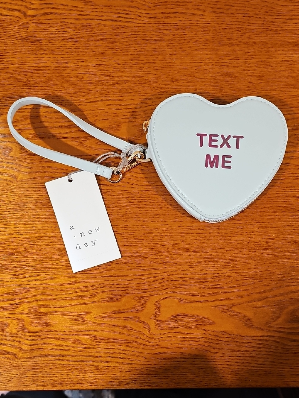 a new day Light Blue Heart Wristlet Wallet with Pink Text